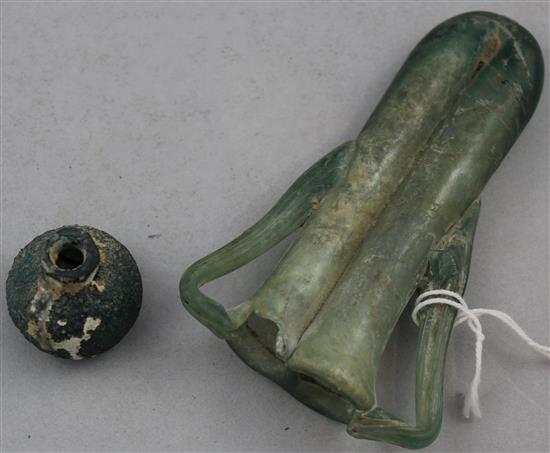 Two Roman green glass vessels, c.2nd century AD, 12cm